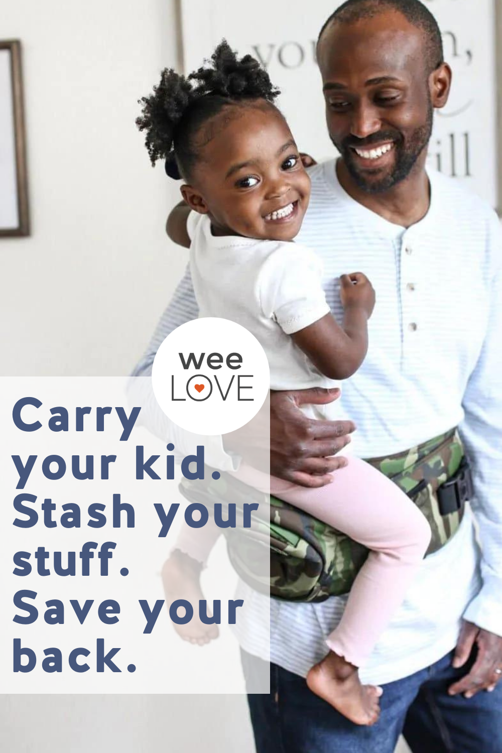 A Black father with a slight beard smiles at his Black daughter, who he is carrying on his hip while using a camo-printed Tushbaby hip carrier. His daughter has her hair in two poufs on top of her head and she smiles at the camera. The text reads "carry your kid. stash your stuff. save your back."